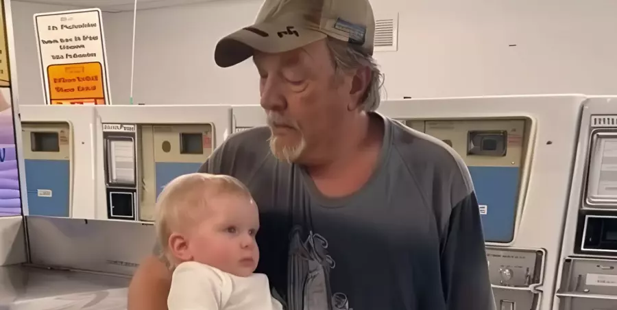 At the laundromat, a stranger offered to hold my grandson: What happened next stopped my heart