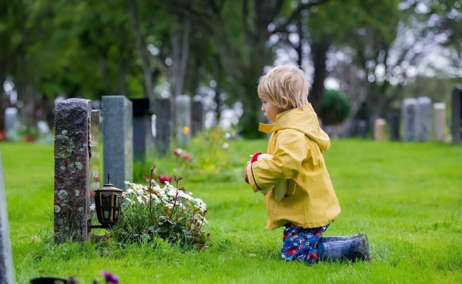 I noticed a little boy near my son's gravestone, and I was shocked to discover who he really was