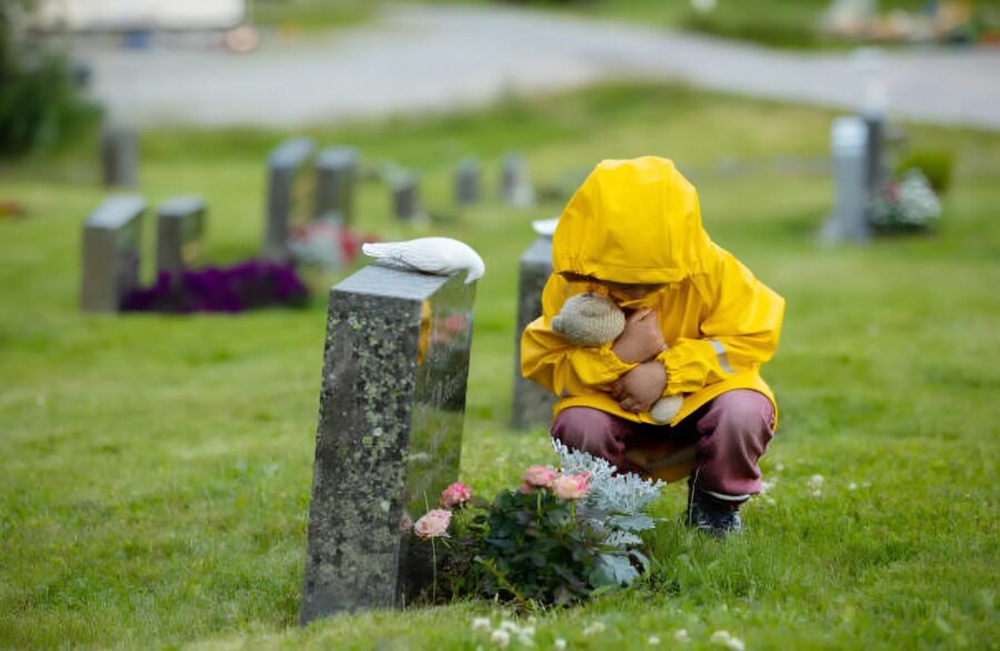 I noticed a little boy near my son's gravestone, and I was shocked to discover who he really was