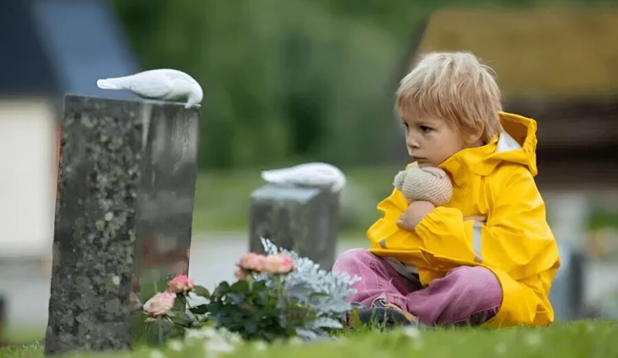 I noticed a little boy near my son's gravestone, and I was shocked to discover who he really was
